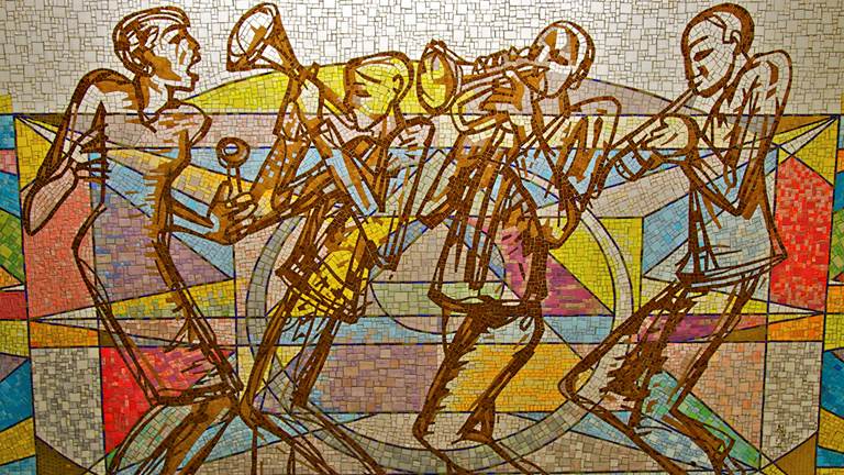 A mosaic wall of a jazz band.