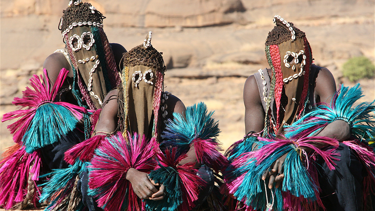 Dogon peoples in traditional ceremonial wear. 