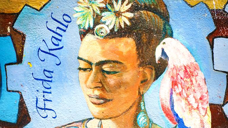 A wall mural of Frida Kahlo. 