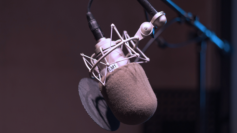 A microphone in a recording studio. 
