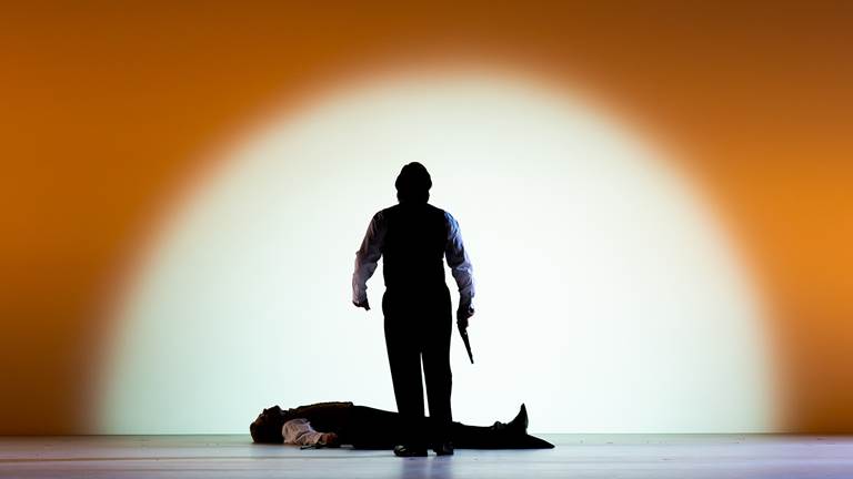 A remorseful Onegin (baritone Igor Golovatenko) stands besides his dead friend Lensky (tenor Alexey Dolgov) in WNO's production of Eugene Onegin, Photo: Scott Suchman