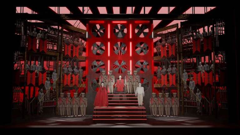 Stage of Turandot with a red  scaffolding-like structure that evokes a factory feel.