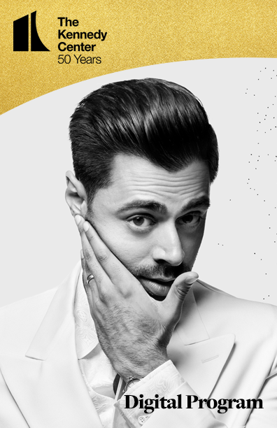 KC 50 Program cover for Hasan Minhaj (looking up and caressing his cheek)